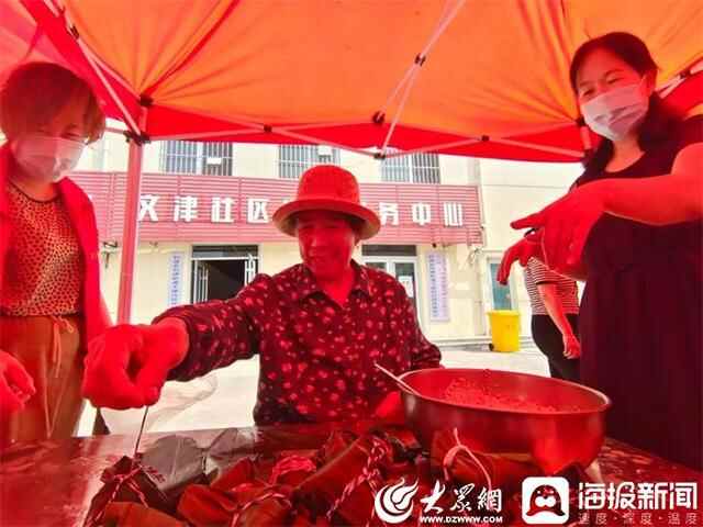 “粽叶飘香 浓情端午”——利津县利津街道文津社区开展端午节包粽子活动