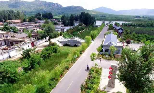 山东邹城市：善用群众“金点子”美化环境有新路