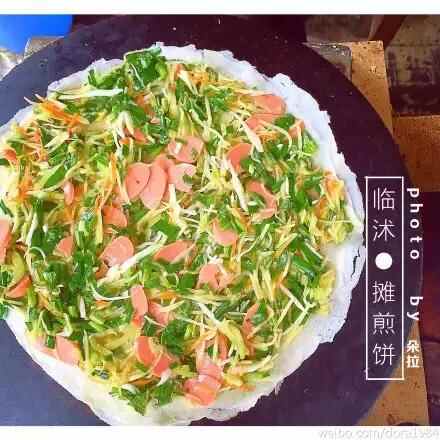 临沭街头美食：摊煎饼 这图片拍的太有文艺范儿！