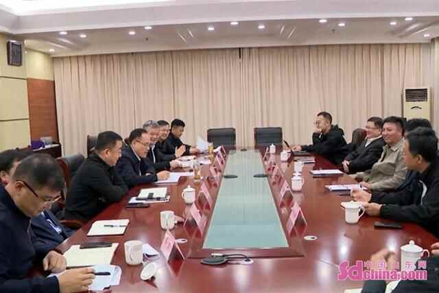 练建军会见到菏泽开发区考察客商